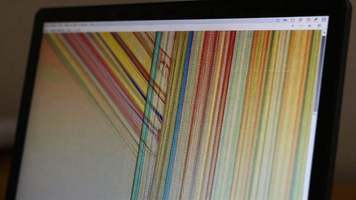 Imagen ilustrativa: primer plano macro de un monitor de ordenador con imagen abstracta